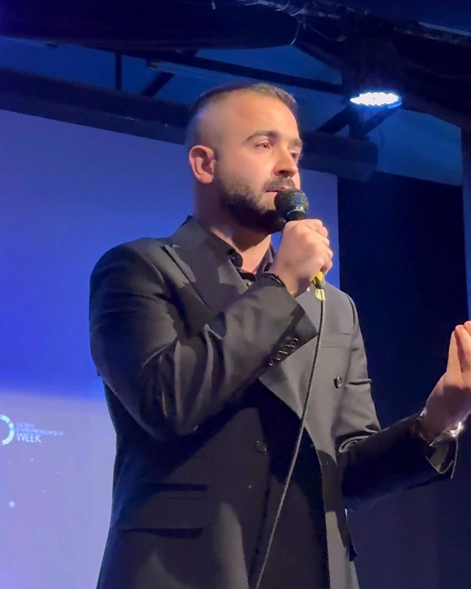 Mohammad Abulfailat speaking on stage at Masterminds Talent 2025